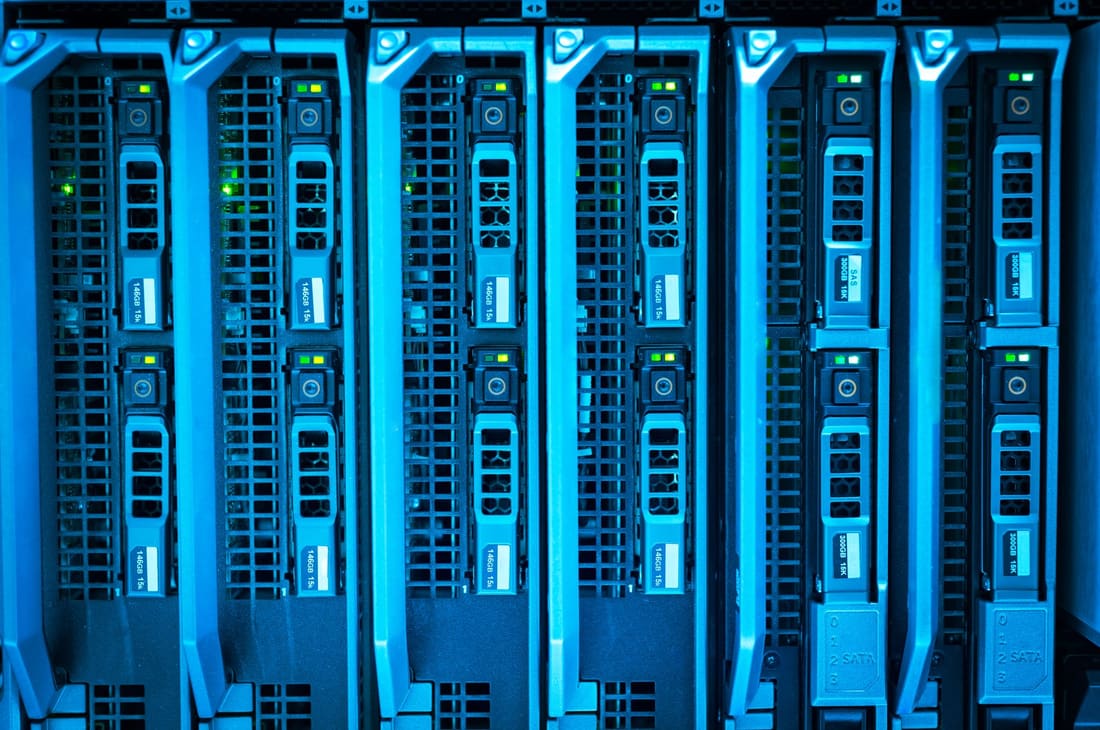Cold-aisle rows of powered equipment racks