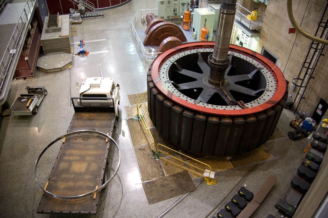 Heavy rotating machine under overhaul in a plant workshop